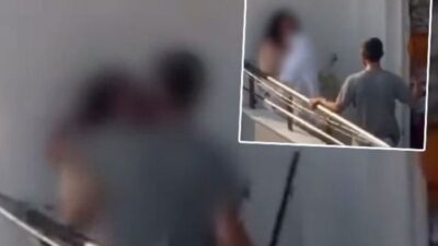 Adana’nın Sarıçam ilçesinde bir kadının balkonda bir erkek tarafından sopayla